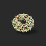 couronne de deuil Genève : roses pastel, marguerites et chrysanthèmes pour un hommage élégant