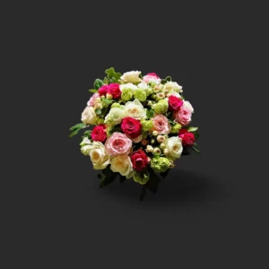 bouquet roses Genève : roses rouges, roses et blanches avec feuillage vert, composition élégante et romantique