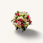 bouquet roses Genève : roses rouges, roses et blanches avec feuillage vert, composition élégante et romantique