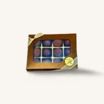 truffes Genève Nocturne Praliné Rohr, boîte 12 chocolats artisanaux avec ruban argenté