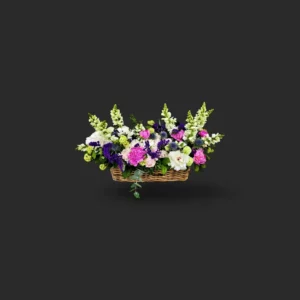 bouquet pivoines Genève : pivoines roses, mufliers et eryngium bleu — hommage funéraire élégant