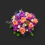 bouquet roses abricot Genève Éveil Prisme, orchidées fuchsia et lisianthus blancs, arrangement printanier luxueux