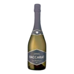 clairière pétillante Genève : bouquet de luxe aux côtés d'une bouteille Baccarat Blanc de Blancs