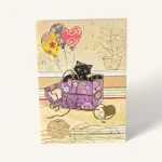 Illustration d'une carte Saint-Valentin chat Genève : un chat noir espiègle sort d'une boîte cadeau violette avec des ballons.