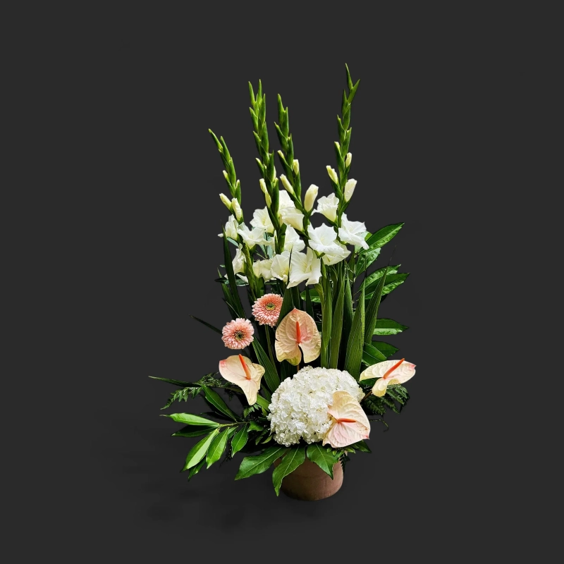 Fleurs deuil Genève glaïeuls blancs hortensia, anthuriums rose pâle et gerberas
