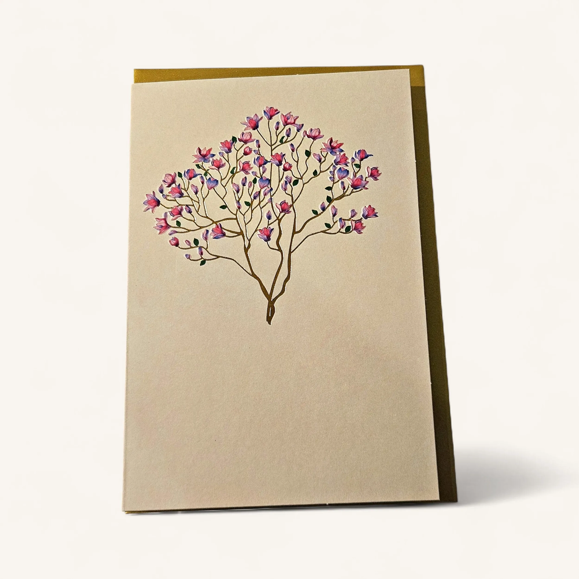QSUzRA.webp Carte condoléances Genève magnolia dorure, arbre en fleurs aux branches dorées sur papier crème